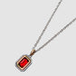Equinox Charm Necklace in Silver and Yellow Gold Trim with Garnet